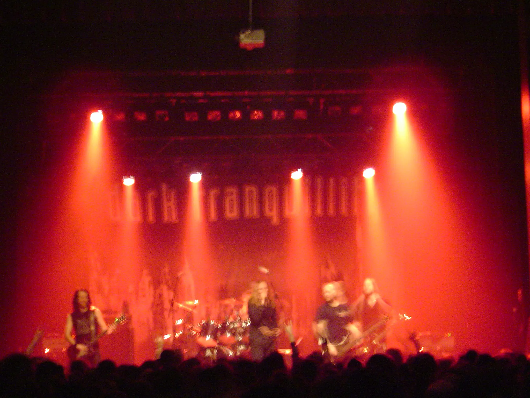 A picture with Dark Tranquillity on stage with the backdrop from the american Character tour 2005-2006.